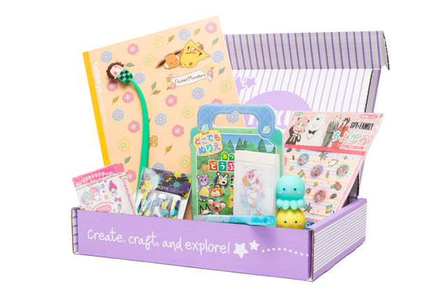 The Inku Stationery Crate by Japan Crate features a purple box filled with kawaii Japanese stationery items like notebooks, stickers, pens, and small toys, all neatly arranged in colorful packaging.