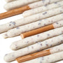 Close-up of Pocky Variety Pack (12-Pack) from Bokksu Market, showing biscuit sticks coated with a white speckled layer, along with one uncoated stick. thumbnail 15