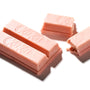Three bittersweet Strawberry Otona no Amasa Kit Kat bars with one piece partially bitten, isolated on a white background. thumbnail 4
