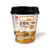 A cup of Yopokki Instant Tteokbokki Rice Cake Cup: Bulgogi on a white background.