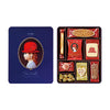 Akai Bhoshi: Blue Gift Box by Bokksu Market is a premium selection of assorted snacks, including cookies and candies, housed in a tin box with a blue lid featuring the profile of a child in a red hat.
