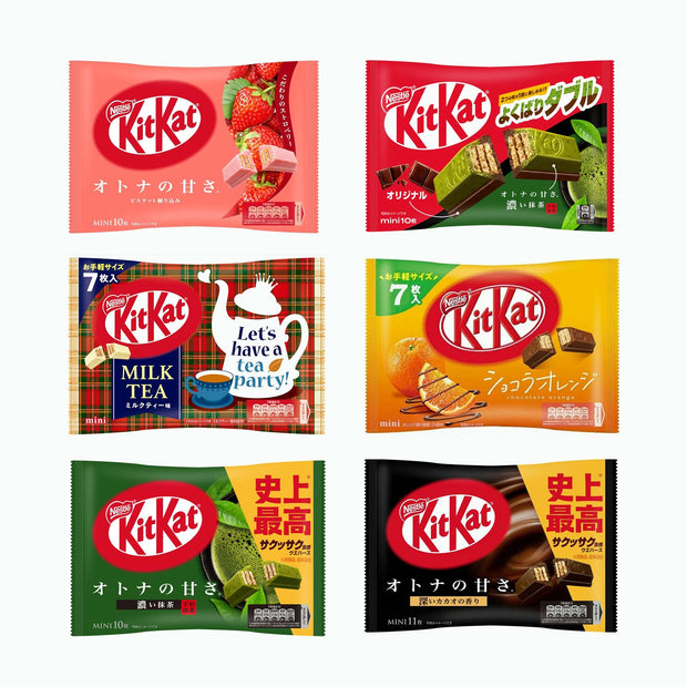 Assortment of six Nestle Japan Japanese Kit Kat 6 Flavor Variety Packs from Japan, featuring limited edition flavors like strawberry, green tea, milk tea, orange, wasabi, and dark chocolate.