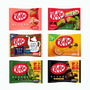 Assortment of six Nestle Japan Japanese Kit Kat 6 Flavor Variety Packs from Japan, featuring limited edition flavors like strawberry, green tea, milk tea, orange, wasabi, and dark chocolate. thumbnail 1