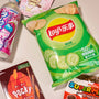 The Snack Attack Lucky Bag by Bokksu Market features authentic Asian snacks like Lay’s cucumber chips, chocolate Pocky, Sangaria Ramune, and Furuta Super Mario candy—perfect for Japanese snack lovers and mystery bag fans. thumbnail 2