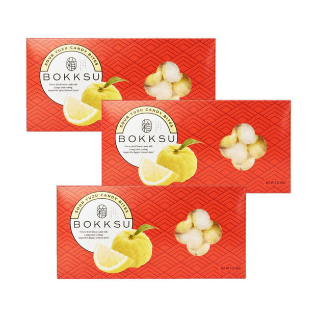 Three boxes of Bokksu Market Sour Yuzu Japanese Candy Bites (3-Pack) are displayed, each featuring Japanese citrus illustrations and white yuzu candies on the packaging.