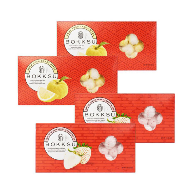 Two boxes of Bokksu Market Japanese Candy Bites Duo: White Strawberry & Sour Yuzu (2-Pack) are displayed, with bold red packaging featuring images of the fruits and candies.