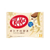 The Bokksu Market's Japanese Kit Kat: White Chocolate package highlights its scrumptious white chocolate flavor with a broken crispy wafer image, accompanied by Japanese text and calorie information.
