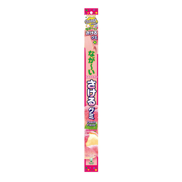 Package of Uha Mikakuto's Uha Long Sakeru Gummy: White Peach, featuring colorful labels with Japanese text and enticing images of peelable gummy candy peaches.