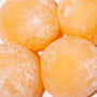 A group of Kubota Daifuku Mochi: Mikan Orange on a white surface. thumbnail 2