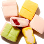A group of UHA Mikakuto Puchao Gummy Candy: Soda Mix of different flavors on a white surface. thumbnail 2