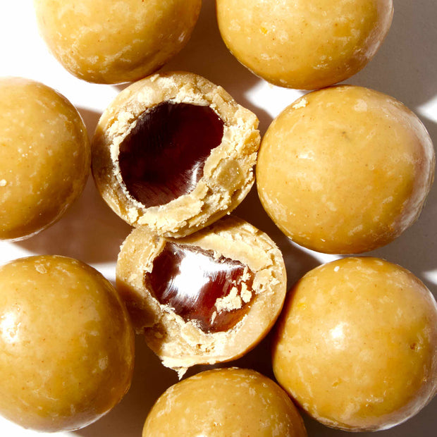 A group of Toko Boba Chocolates: Brown Sugar Milk Tea with a hole in the middle.