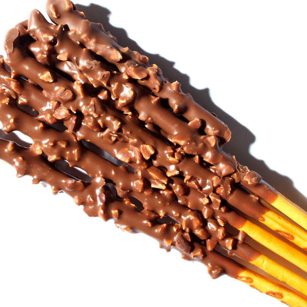 Glico Pocky: Almond Crush covered pretzel sticks on a white background.