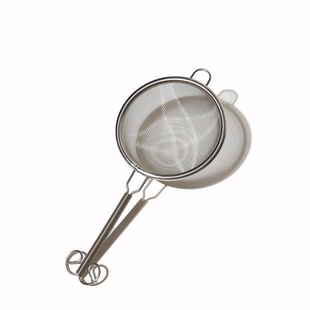 An Aiya Hand Sifter on a white background.