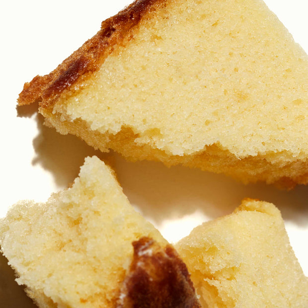 A Sakura Castella Cake with a bite taken out of it.