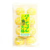 Kubota pineapple balls in a bag on a white background.