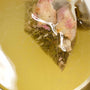 A Yamamotoyama tea bag filled with liquid and a piece of meat. thumbnail 2