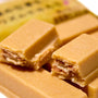 A group of pieces of Japanese Kit Kat: Whole Wheat Cookie candy by Nestle Japan on a white plate. thumbnail 4