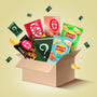 The Mystery Pack by Bokksu Market is an open box of unique Asian snacks like KitKat and Lay’s, plus green mystery packages marked with question marks. thumbnail 1