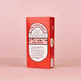 A red rectangular Bokksu Market box featuring the White Strawberry Japanese Candy Bites (2-Pack) is displayed with white and black text on a plain light pink background. thumbnail 4