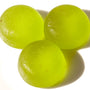 Three Kasugai Frutia Kiwi Gummy on a white surface. thumbnail 2