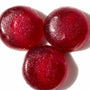 Three Kasugai Frutia Grape Gummy bears on a white surface. thumbnail 2