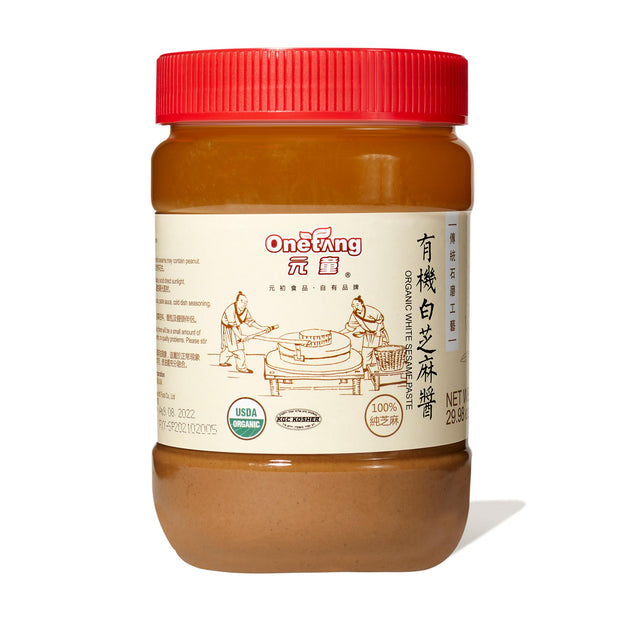 An Onetang Organic Sesame Paste jar on a white background.