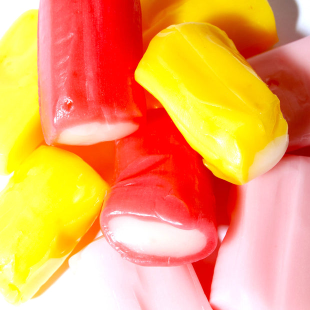 A pile of Morinaga Hi-Chew: Sweet & Sour candy on a white surface.