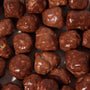 A pile of Doraemon Kapucho Chocolate Biscuit Cookies on a white plate. thumbnail 2