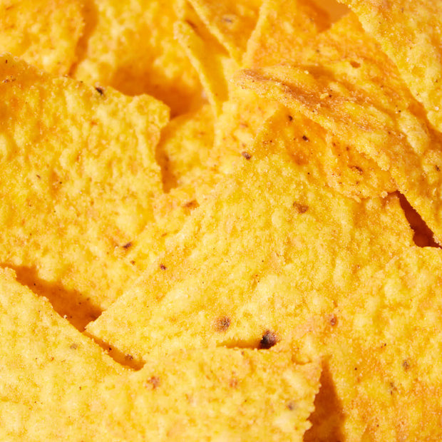 A pile of Doritos: Sichuan Peppercorn Chicken chips on a plate.