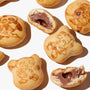 A group of Meiji Hello Panda: Chocolate cookies with drawings on them. thumbnail 2