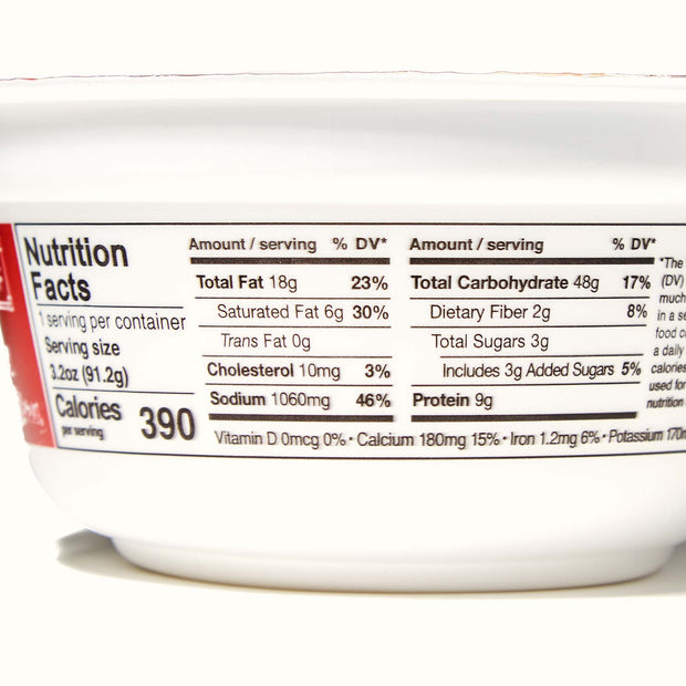 A bowl of Hikari Menraku Ramen Bowl: Sichuan-Style Dan Dan Noodle with a nutrition label on it.