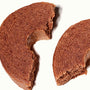 A slice of Suzuya Mini Baumkuchen: Chocolate cake on a white surface. thumbnail 2